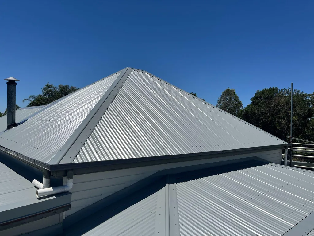 After: new roof sheeting and ridge