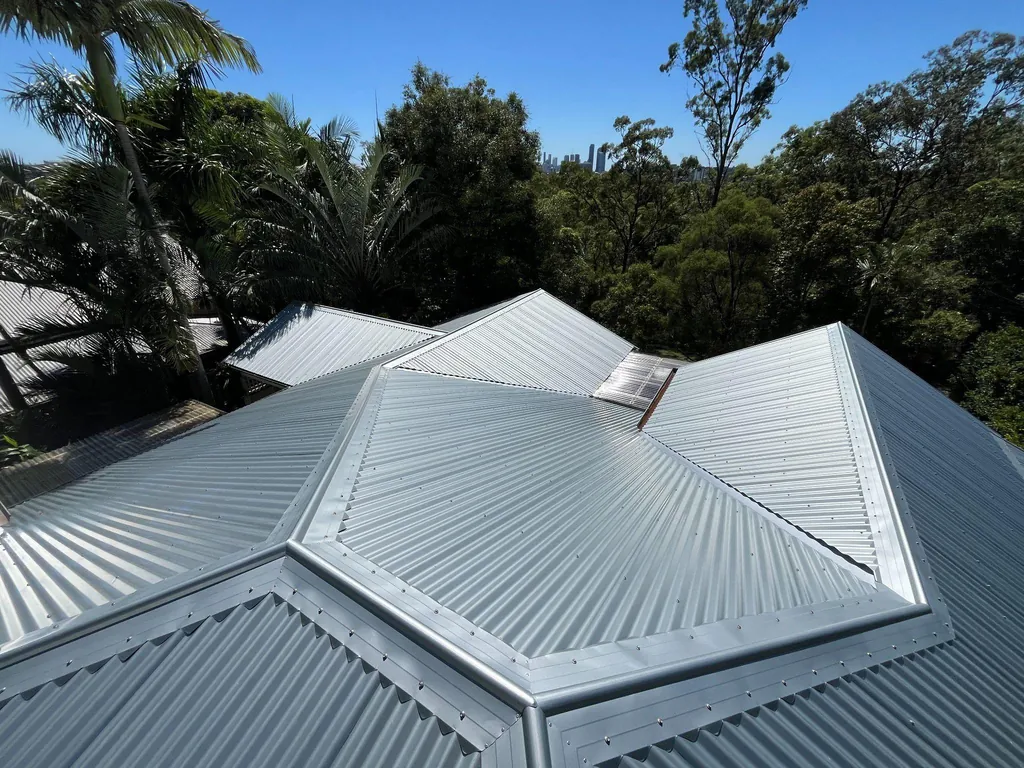 After: new hip roof and flashings